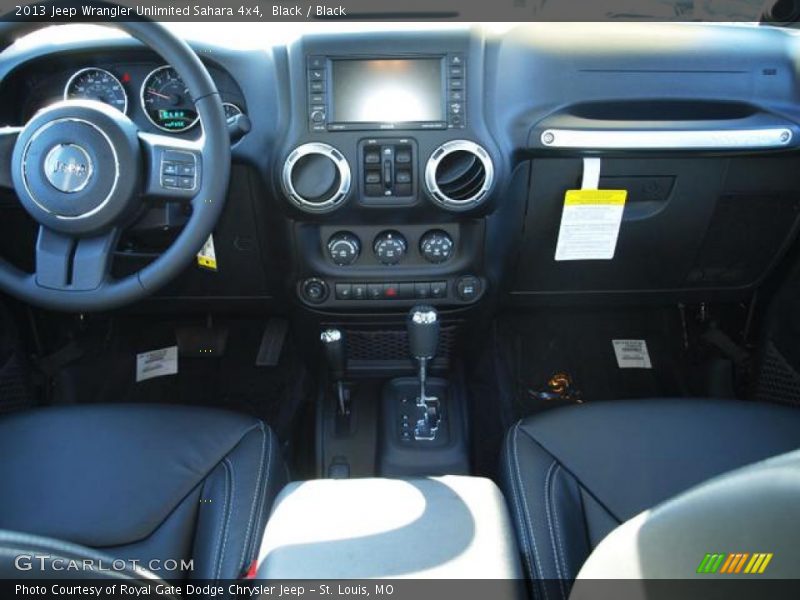 Black / Black 2013 Jeep Wrangler Unlimited Sahara 4x4