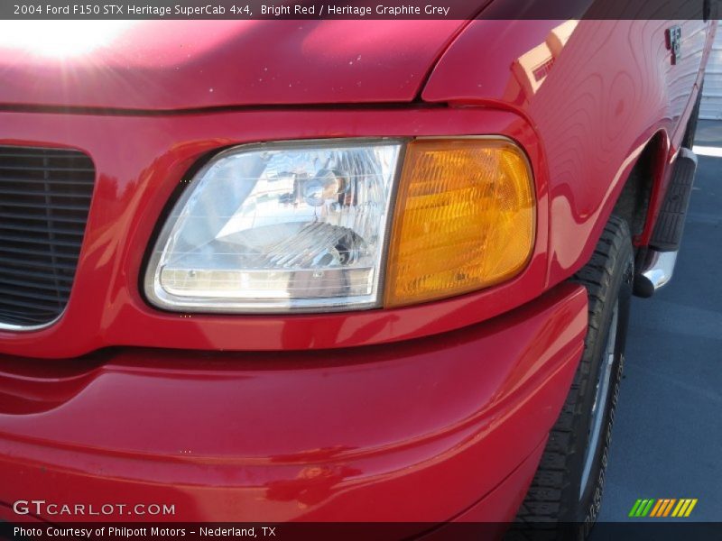 Bright Red / Heritage Graphite Grey 2004 Ford F150 STX Heritage SuperCab 4x4