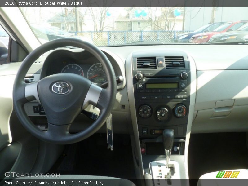 Super White / Bisque 2010 Toyota Corolla