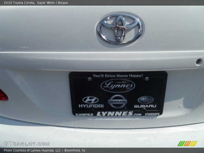 Super White / Bisque 2010 Toyota Corolla