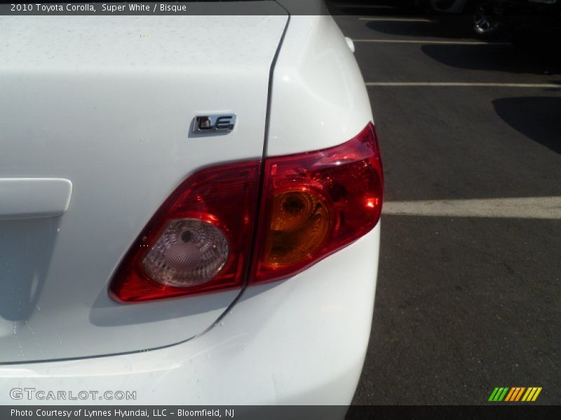 Super White / Bisque 2010 Toyota Corolla