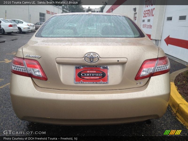 Sandy Beach Metallic / Bisque 2010 Toyota Camry LE