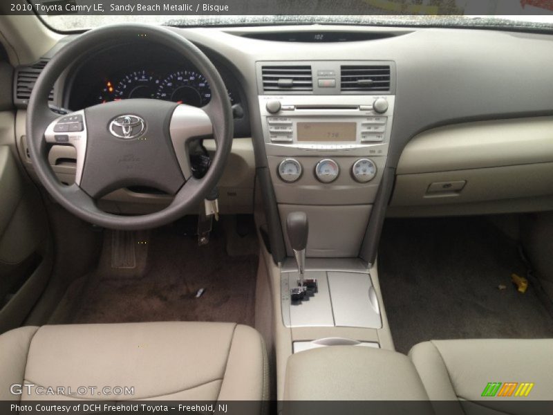 Sandy Beach Metallic / Bisque 2010 Toyota Camry LE