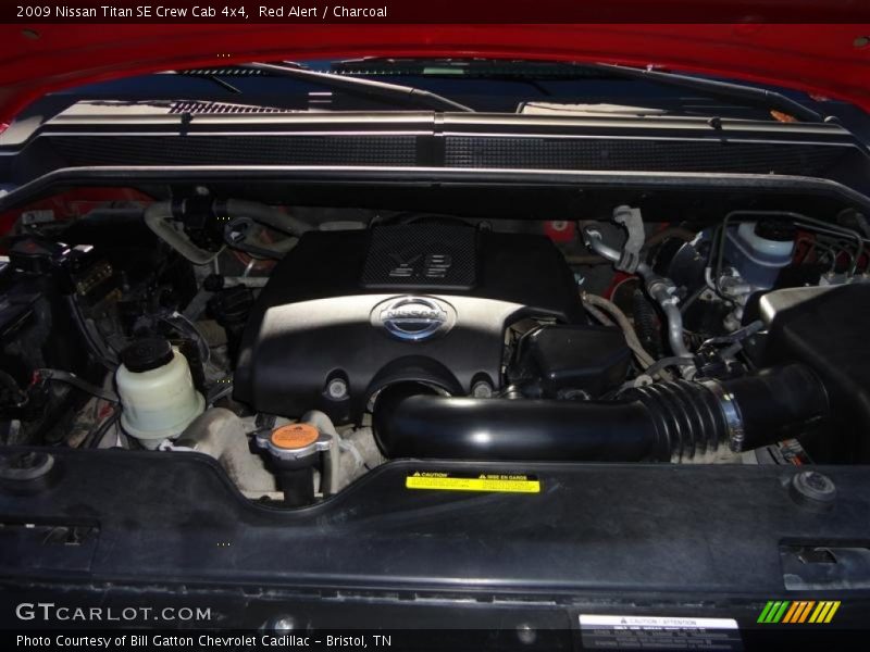 Red Alert / Charcoal 2009 Nissan Titan SE Crew Cab 4x4