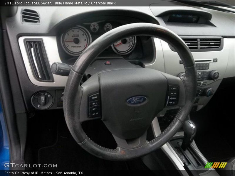 Blue Flame Metallic / Charcoal Black 2011 Ford Focus SEL Sedan