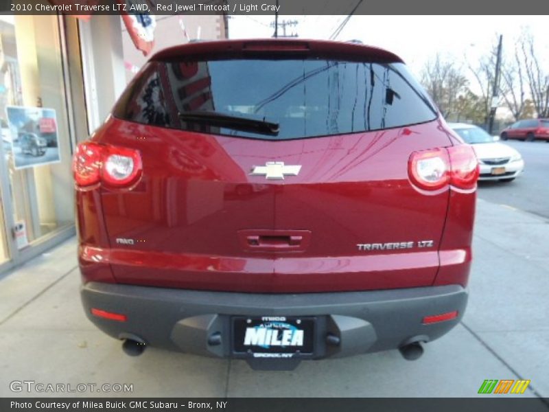 Red Jewel Tintcoat / Light Gray 2010 Chevrolet Traverse LTZ AWD