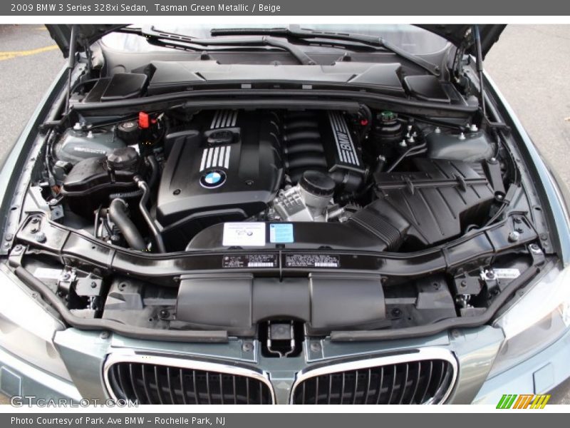 Tasman Green Metallic / Beige 2009 BMW 3 Series 328xi Sedan