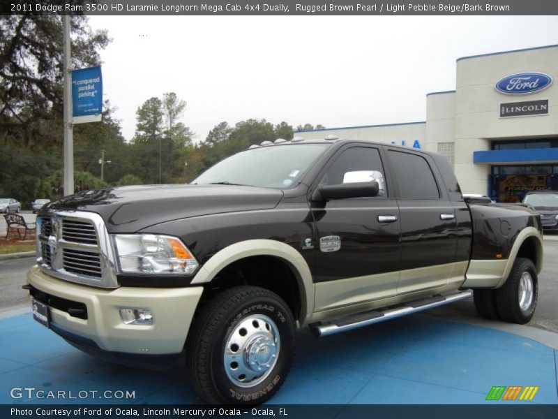 Front 3/4 View of 2011 Ram 3500 HD Laramie Longhorn Mega Cab 4x4 Dually