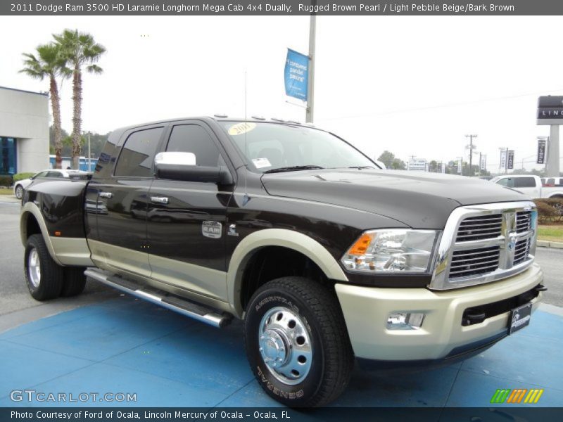 Front 3/4 View of 2011 Ram 3500 HD Laramie Longhorn Mega Cab 4x4 Dually