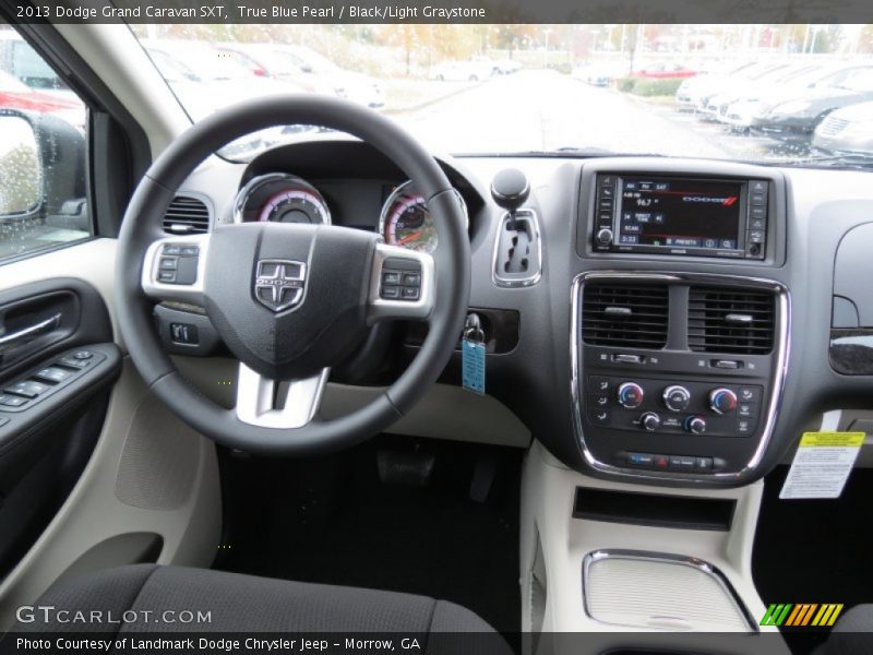 Dashboard of 2013 Grand Caravan SXT