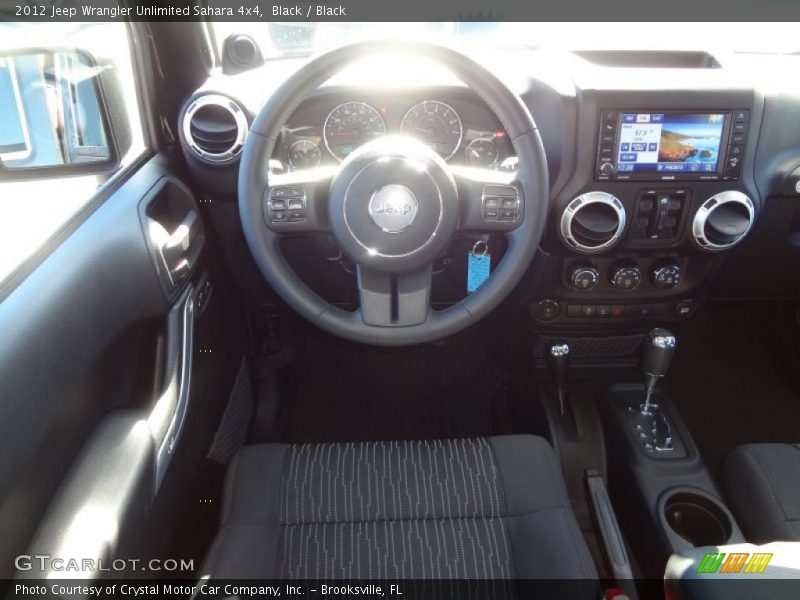 Black / Black 2012 Jeep Wrangler Unlimited Sahara 4x4