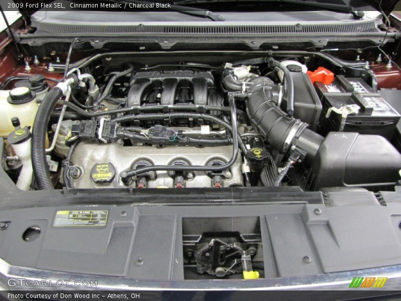 Cinnamon Metallic / Charcoal Black 2009 Ford Flex SEL
