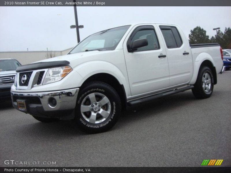 Avalanche White / Beige 2010 Nissan Frontier SE Crew Cab