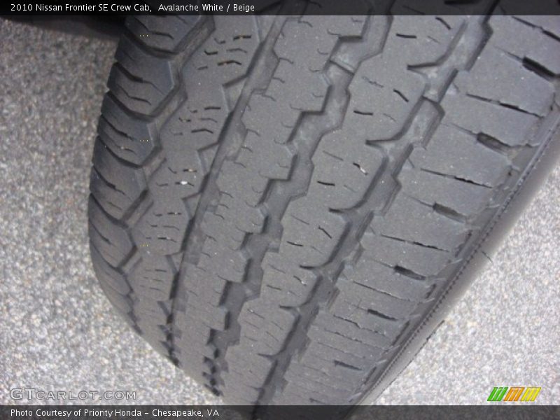 Avalanche White / Beige 2010 Nissan Frontier SE Crew Cab