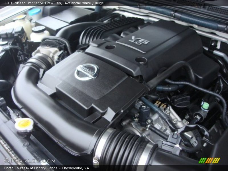 Avalanche White / Beige 2010 Nissan Frontier SE Crew Cab