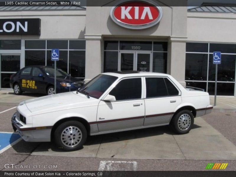 White / Red 1985 Cadillac Cimarron Sedan