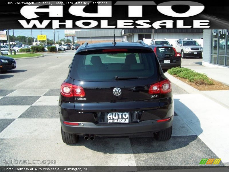 Deep Black Metallic / Sandstone 2009 Volkswagen Tiguan SE