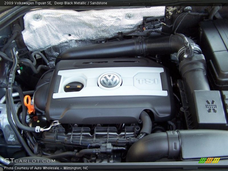 Deep Black Metallic / Sandstone 2009 Volkswagen Tiguan SE