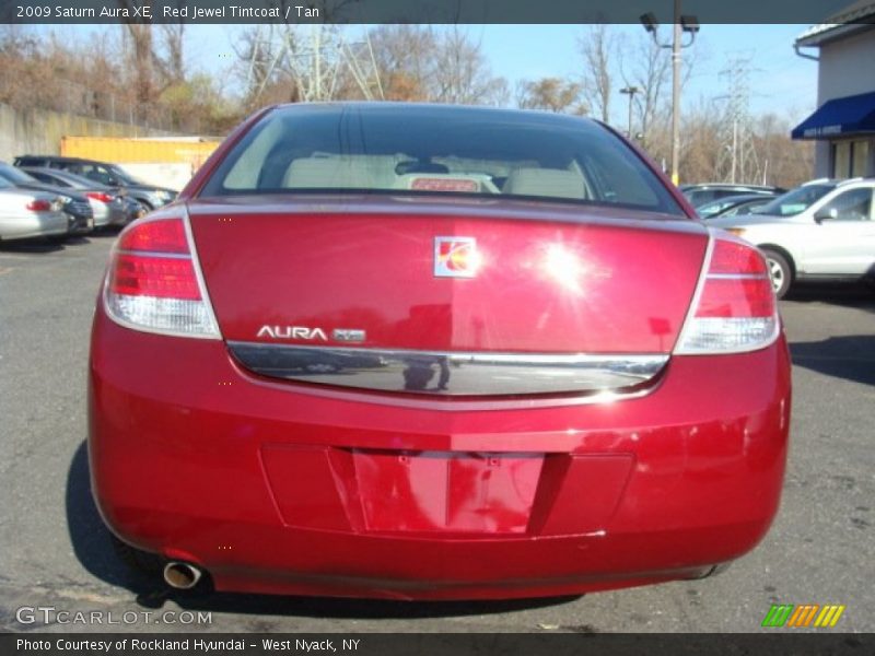 Red Jewel Tintcoat / Tan 2009 Saturn Aura XE