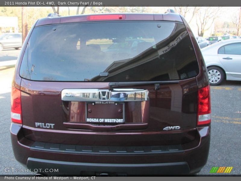 Dark Cherry Pearl / Beige 2011 Honda Pilot EX-L 4WD