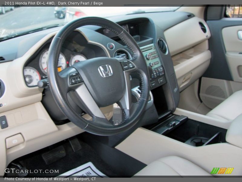 Dark Cherry Pearl / Beige 2011 Honda Pilot EX-L 4WD