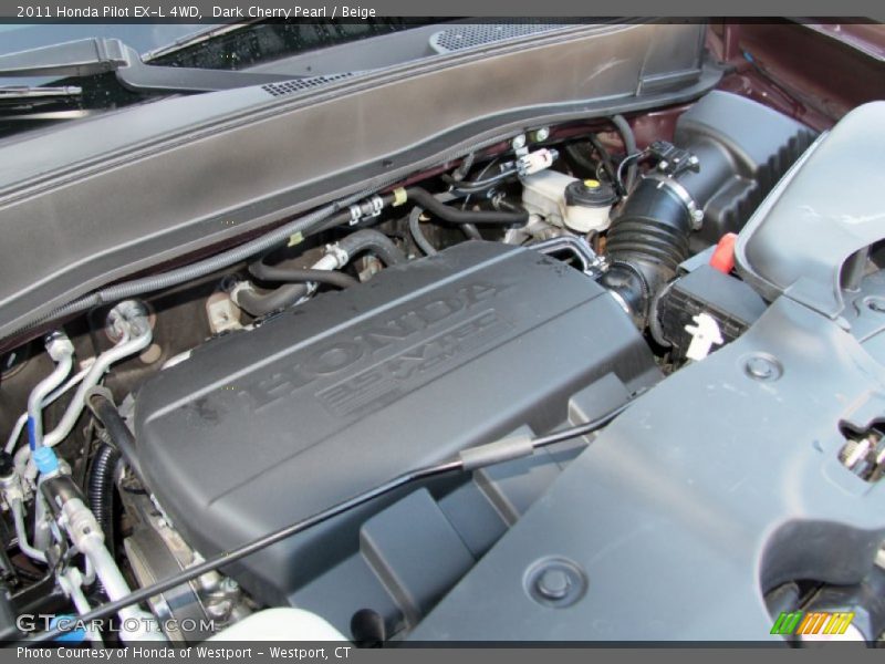 Dark Cherry Pearl / Beige 2011 Honda Pilot EX-L 4WD