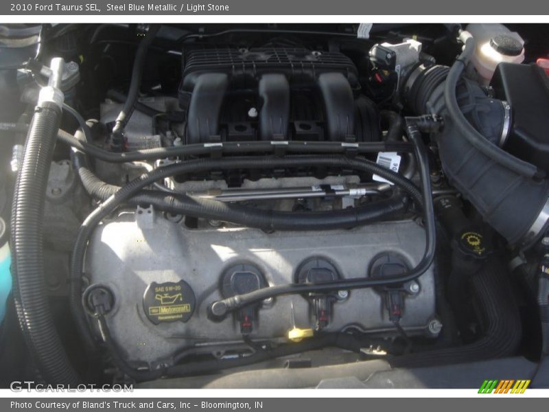 Steel Blue Metallic / Light Stone 2010 Ford Taurus SEL