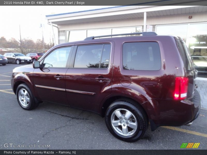 Dark Cherry Pearl / Beige 2010 Honda Pilot EX 4WD