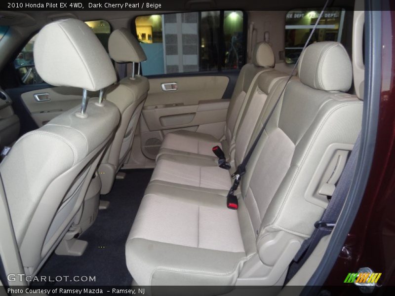 Dark Cherry Pearl / Beige 2010 Honda Pilot EX 4WD