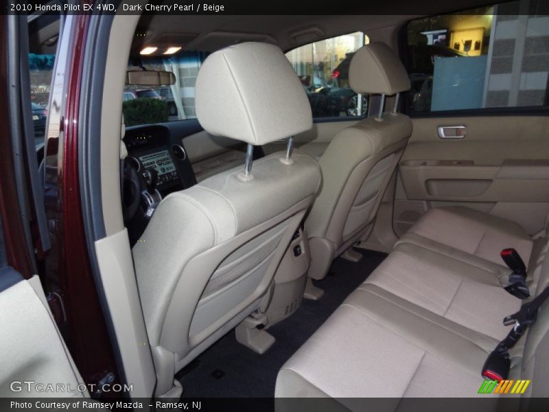 Dark Cherry Pearl / Beige 2010 Honda Pilot EX 4WD