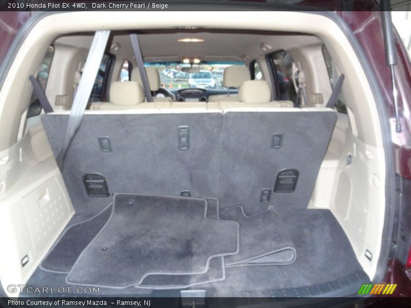Dark Cherry Pearl / Beige 2010 Honda Pilot EX 4WD