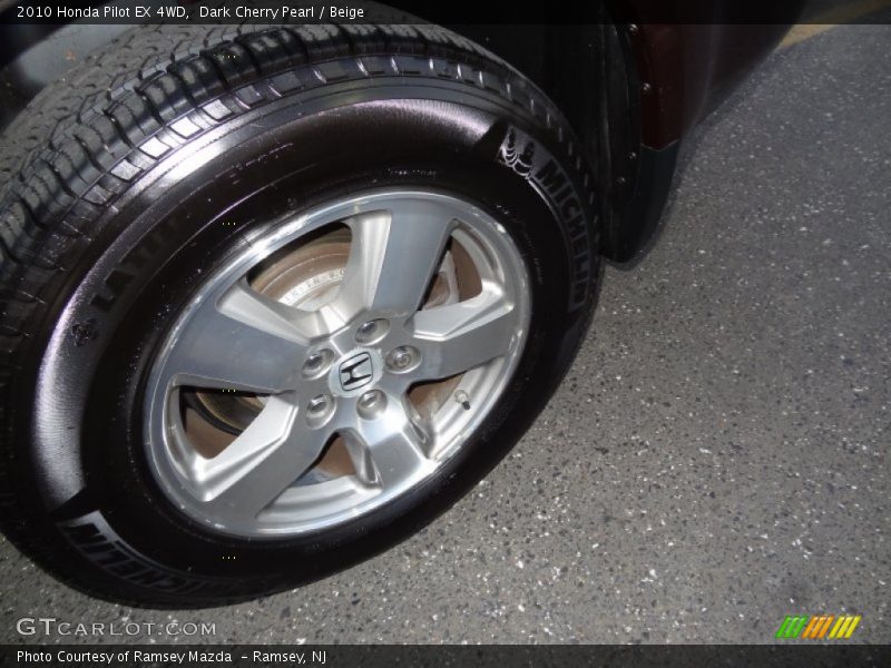 Dark Cherry Pearl / Beige 2010 Honda Pilot EX 4WD
