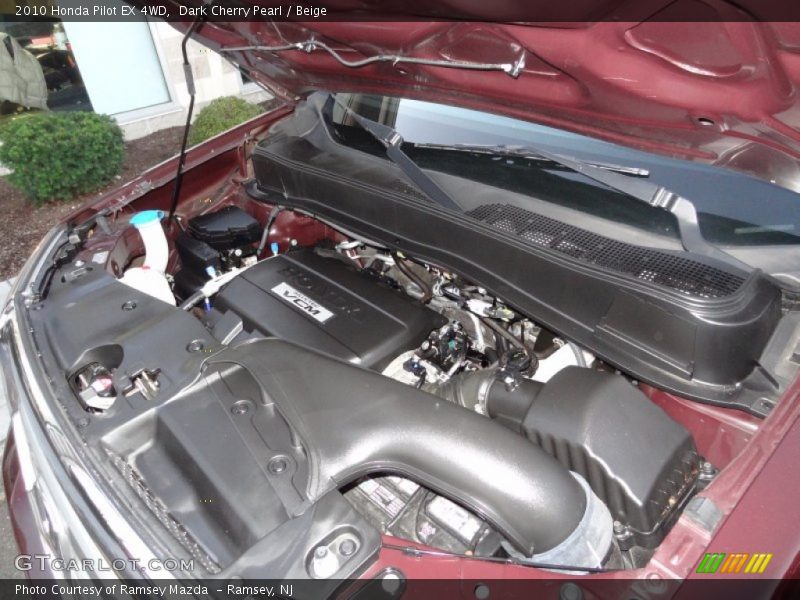 Dark Cherry Pearl / Beige 2010 Honda Pilot EX 4WD