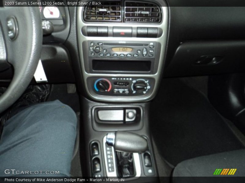 Bright Silver / Black 2003 Saturn L Series L200 Sedan
