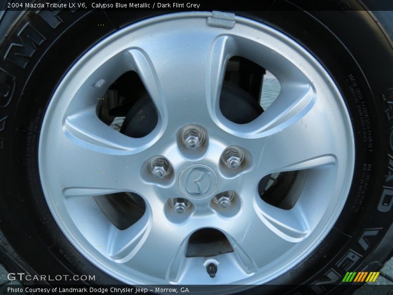 2004 Tribute LX V6 Wheel