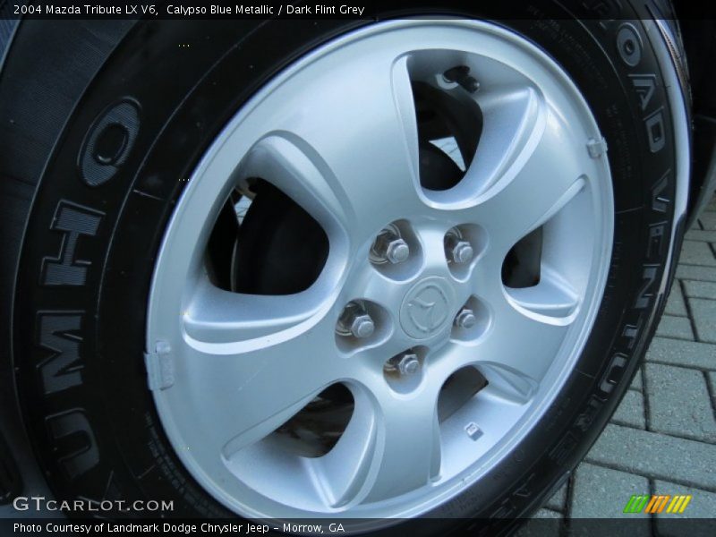  2004 Tribute LX V6 Wheel