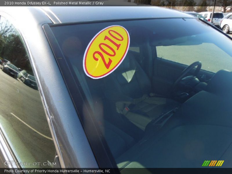 Polished Metal Metallic / Gray 2010 Honda Odyssey EX-L