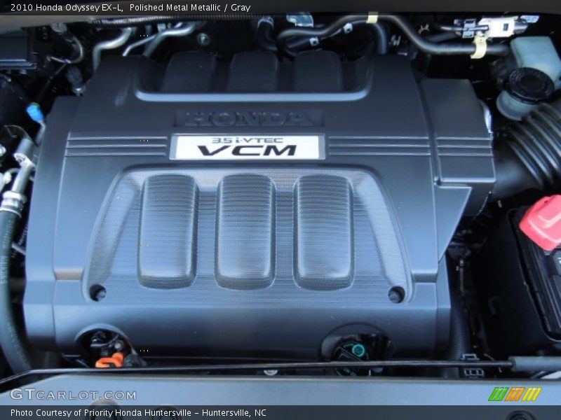 Polished Metal Metallic / Gray 2010 Honda Odyssey EX-L