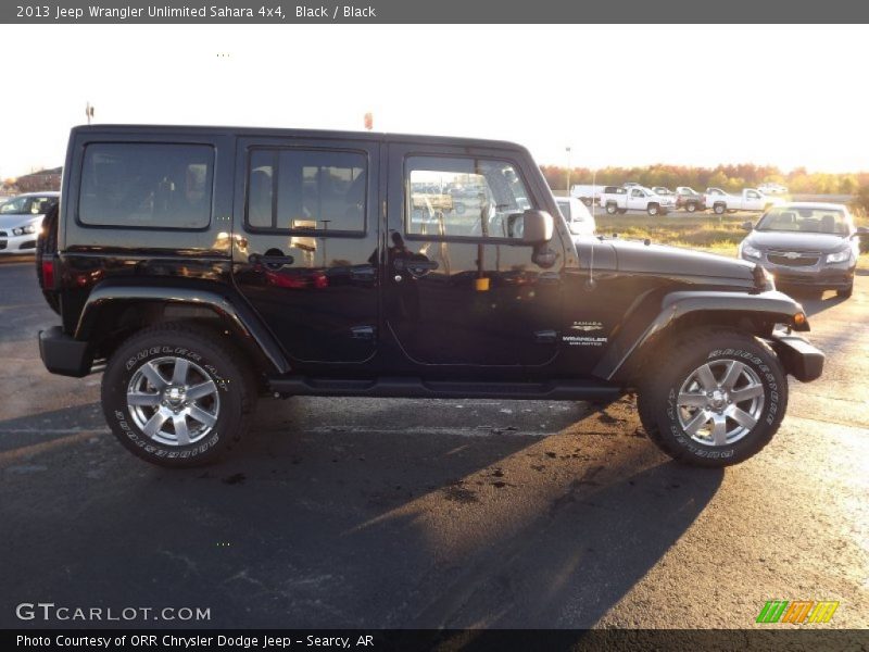 Black / Black 2013 Jeep Wrangler Unlimited Sahara 4x4