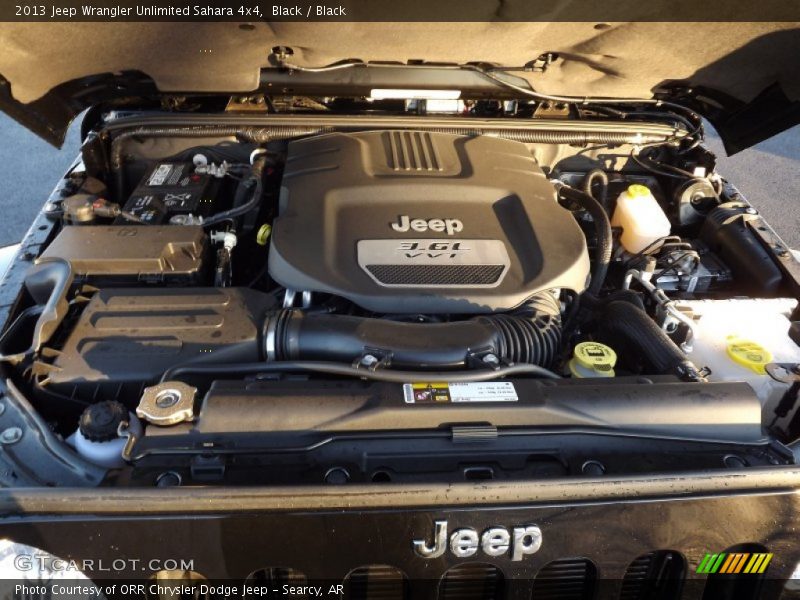 Black / Black 2013 Jeep Wrangler Unlimited Sahara 4x4