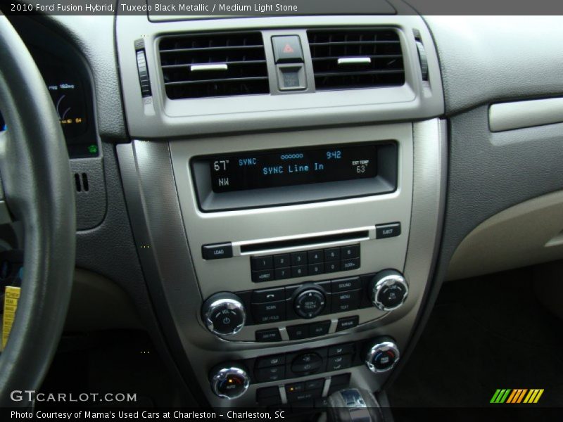 Tuxedo Black Metallic / Medium Light Stone 2010 Ford Fusion Hybrid