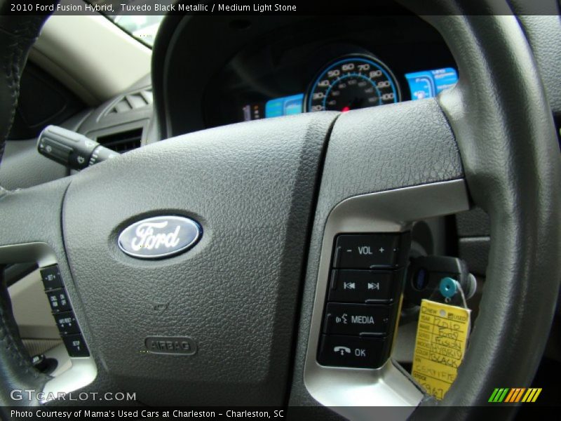 Tuxedo Black Metallic / Medium Light Stone 2010 Ford Fusion Hybrid