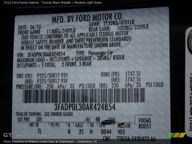 Tuxedo Black Metallic / Medium Light Stone 2010 Ford Fusion Hybrid
