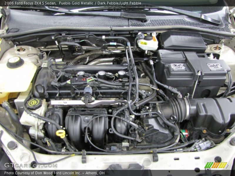 Pueblo Gold Metallic / Dark Pebble/Light Pebble 2006 Ford Focus ZX4 S Sedan