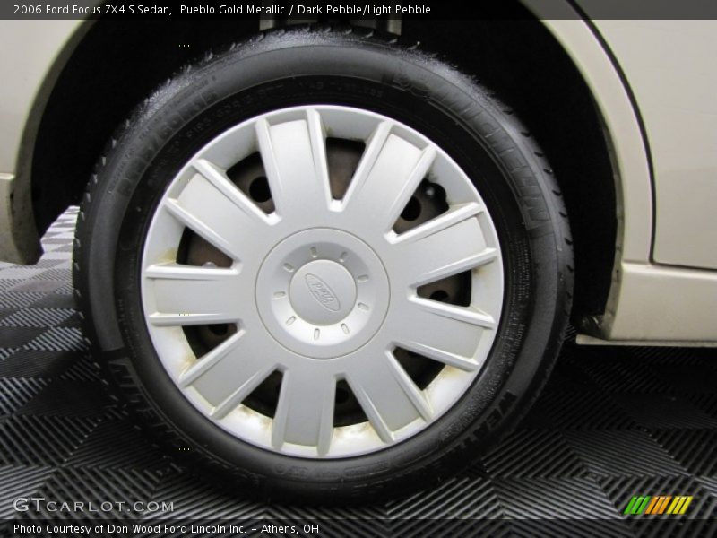 Pueblo Gold Metallic / Dark Pebble/Light Pebble 2006 Ford Focus ZX4 S Sedan