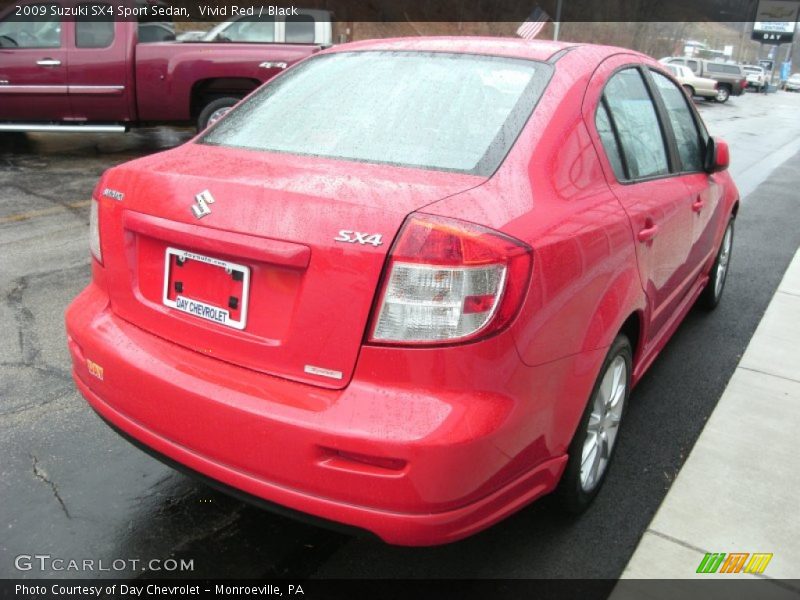 Vivid Red / Black 2009 Suzuki SX4 Sport Sedan