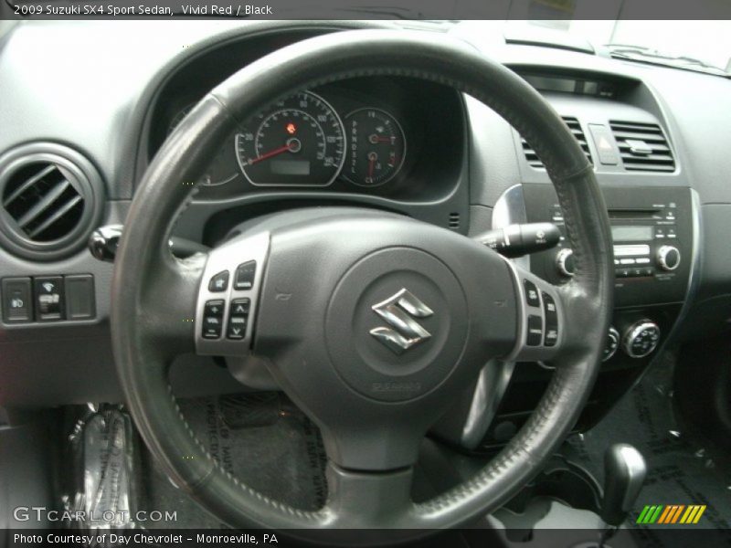 Vivid Red / Black 2009 Suzuki SX4 Sport Sedan