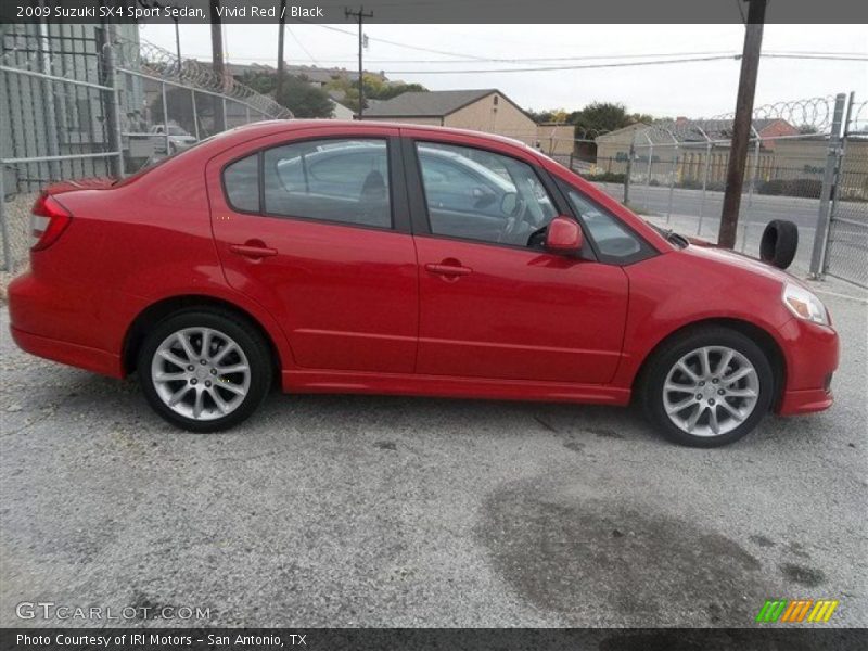 Vivid Red / Black 2009 Suzuki SX4 Sport Sedan