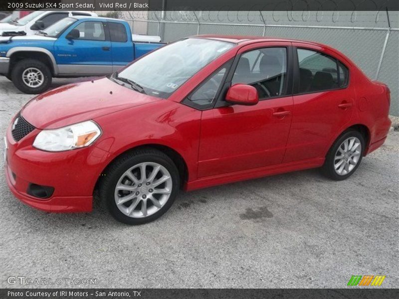 Vivid Red / Black 2009 Suzuki SX4 Sport Sedan