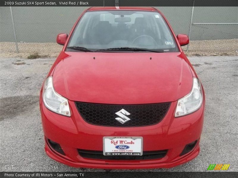 Vivid Red / Black 2009 Suzuki SX4 Sport Sedan